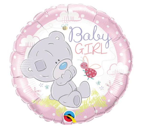 Inflated light pink foil balloon with white center with image of a gray baby bear sitting in grass playing with a pink bird with phrase "baby girl" in purple and pink fonts.